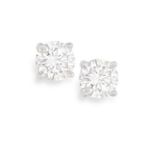 A PAIR OF DIAMOND EARSTUDS Each brilliant-cut diamond within a four-claw setting, mounted in gold,