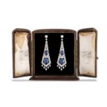 A PAIR OF EARLY 20TH CENTURY SAPPHIRE AND DIAMOND PENDENT EARRINGS, CIRCA 1920 Each old cushion-