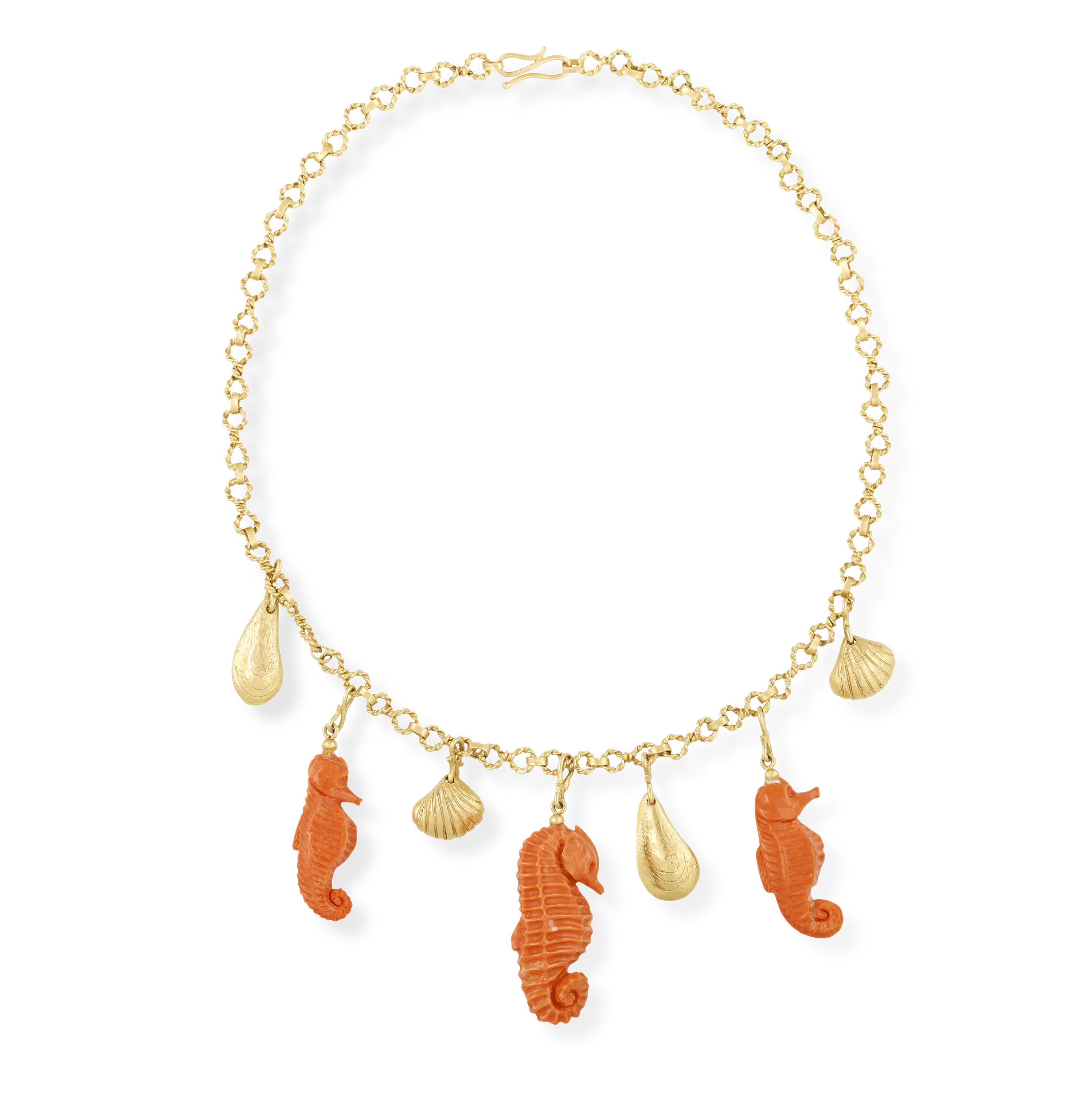 A CORAL AND GOLD CHARM NECKLACE, CIRCA 1960 The fancy-link chain with ropetwist detail suspending