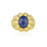 A SAPPHIRE SINGLE-STONE RING, BY SABBADINI Of bombé design, the oval-shaped cabochon sapphire