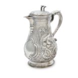 A VICTORIAN IRISH SILVER HOT WATER JUG, Dublin c.1856, maker's mark of John Smyth, with vacant