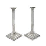 A PAIR OF GEORGE III IRISH SILVER CANDLESTICKS IN THE FORM OF CORINTHIAN COLUMNS with removable