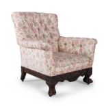 AN IRISH MAHOGANY FRAMED BUTTON BACK UPHOLSTERED ARMCHAIR, 19th century, with rectangular back and