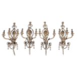A SET OF FOUR GILT GESSO WALL BRACKETS, in Neo-Classical style, each with three scrolled branches