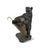 A LARGE SWISS 'BLACK FOREST' CARVED LINDEN WOOD BEAR HALL/UMBRELLA STAND, 19th Century, the standing