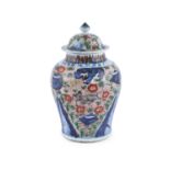 A CHINESE 'WUCAI' PORCELAIN BALUSTER VASE AND COVER, Transitional period, mid-17th century, the