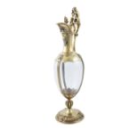 A FINE VICTORIAN SILVER GILT AND GLASS CLARET JUG, by John Figg, London 1857, contained in a