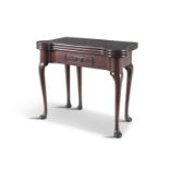 AN IRISH GEORGE III MAHOGANY TRIPLE FOLDING TOP GAMES/TEA TABLE, the plain frieze centred by a short