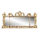 AN IRISH GEORGE III CARVED GILTWOOD LONG RECTANGULAR OVERMANTLE MIRROR, in the chinoiserie manner.