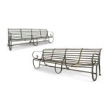 A PAIR OF VICTORIAN WROUGHT IRON FOUR SEATER GARDEN BENCHES, with slatted back and scrollwork arm on