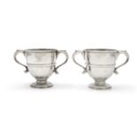 A PAIR OF IRISH GEORGE III SILVER TWO HANDLED CUPS, Dublin c.1735, makers mark of John Williamson,