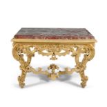 A GILTWOOD AND MARBLE TOP SIDE TABLE, first quarter of 18th century, fitted with heavy rouge marble,