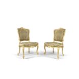 THE KILDARE HOUSE CHAIRS A PAIR OF CARVED GILTWOOD CHAIRS, c.1759, in the fashionable rococo style