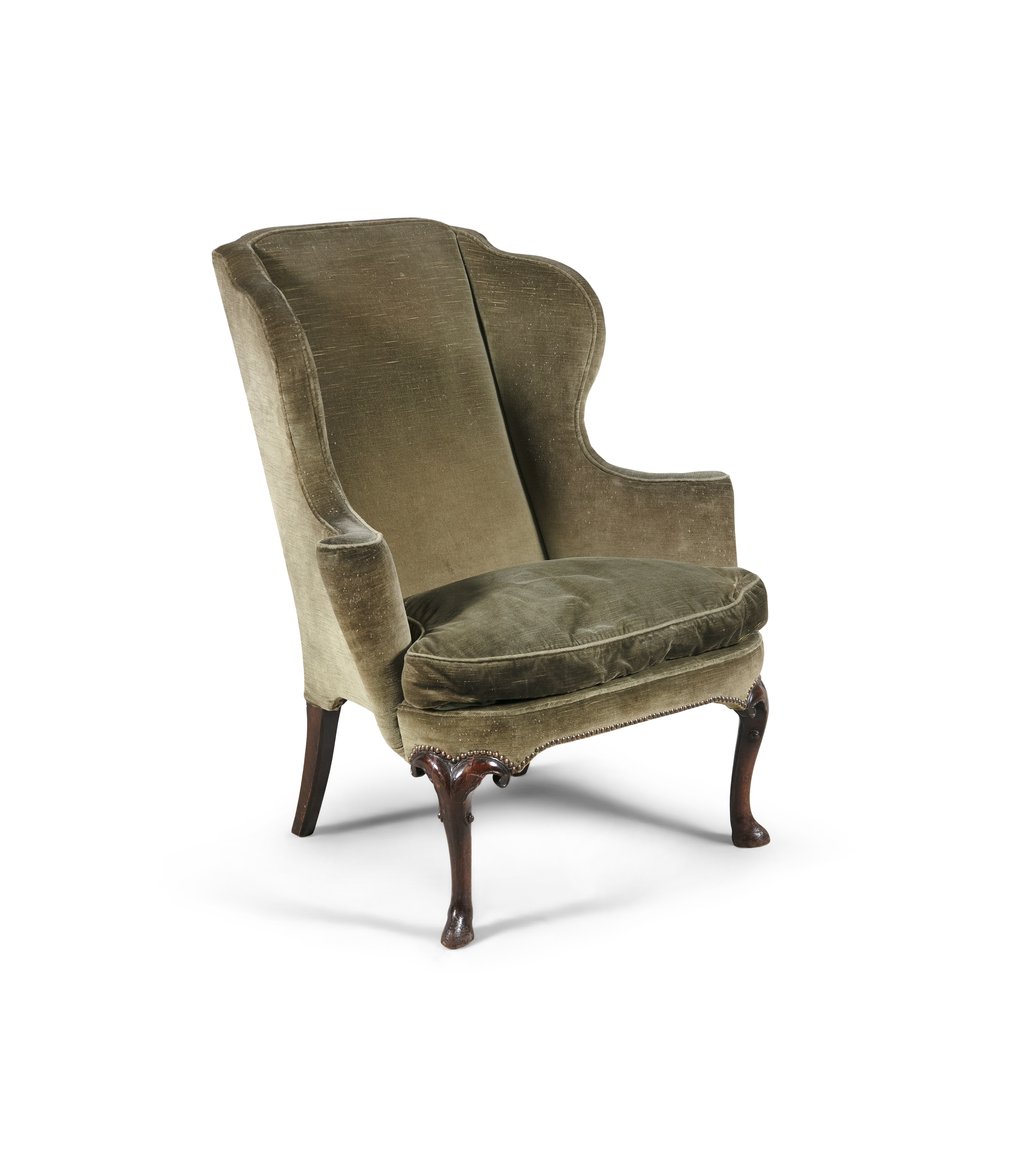 A GEORGE III MAHOGANY FRAMED WING BACK ARMCHAIR, upholstered in moss green fabric, on cabriole