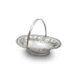 AN IRISH GEORGE III SILVER OVAL FRUIT BASKET, Dublin 1786, the body with pierced trellis banding,