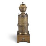 A 19TH CENTURY BRASS BRAZIER, the urn shaped top on a pedestal support, with lion mask ring handles.