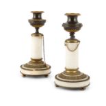 A PAIR OF EARLY 19TH CENTURY WHITE MARBLE, GILT BRASS AND BRONZE COLUMNAR CANDLESTICKS, with urn