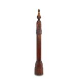 AN EARLY 20TH CENTURY CARVED MAHOGANY STAIRCASE PILLAR AND HANDRAIL, the turned pointed top with