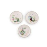 A SET OF THREE WORCESTER DESSERT PLATES, the pale pink ground decorated with flowers and
