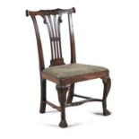 AN EARLY GEORGE III MAHOGANY FRAMED SIDE CHAIR, with carved crest rail with scroll ends above a