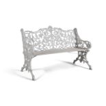 A VICTORIAN WHITE PAINTED CAST IRON GARDEN BENCH, the pierced back with naturalistic fruiting vines,