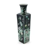 A CHINESE FAMILLE NOIR SQUARE TAPERING VASE, 19th century, with flared rim, each side decorated with