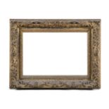 A 19TH CENTURY GILTWOOD AND GESSO PICTURE FRAME, carved with scroll and foliate decoration. Exterior