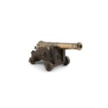 A PERCUSSION ACTION BRASS AND OAK FRAMED SIGNAL CANNON, 18/19th century, the detachable four ring