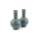 A PAIR OF CHINESE CLOISONNE ENAMEL VASES, 19th century, of baluster form, decorated with a scrolling