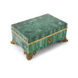 A 19TH CENTURY MALACHITE VENEERED CASKET SHAPED BOX, with ormolu mounts and canted foliate feet,