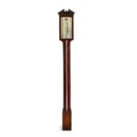 AN EARLY 19TH CENTURY MAHOGANY STICK BAROMETER,with architectural pediment above a brass scale,