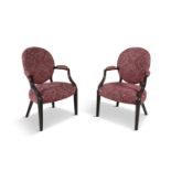 A PAIR OF GEORGE III MAHOGANY OPEN ARMCHAIRS, the shield shaped backs above padded and moulded