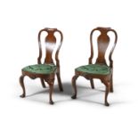 A PAIR OF 18TH CENTURY WALNUT FRAMED SIDE CHAIRS, with vase splat backs, drop-in seats, with bow