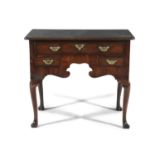 A GEORGE III MAHOGANY RECTANGULAR LOW BOY, with moulded rim above one long frieze drawer and two