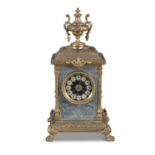 A FRENCH GILTMETAL MANTLE CLOCK, late 19th century, of rectangular form surmounted with a
