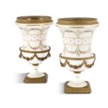 A PAIR OF FRENCH 19TH CENTURY URN SHAPED VASES, French, 19th Century, with gilt metal mounts,
