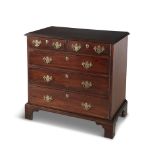 A COMPACT GEORGE III MAHOGANY RECTANGULAR CHEST, with moulded top above two short and three long