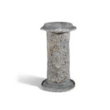A 19TH CENTURY CAST LEAD PEDESTAL, of cylindrical decorated in low relief with leaf scroll panels.