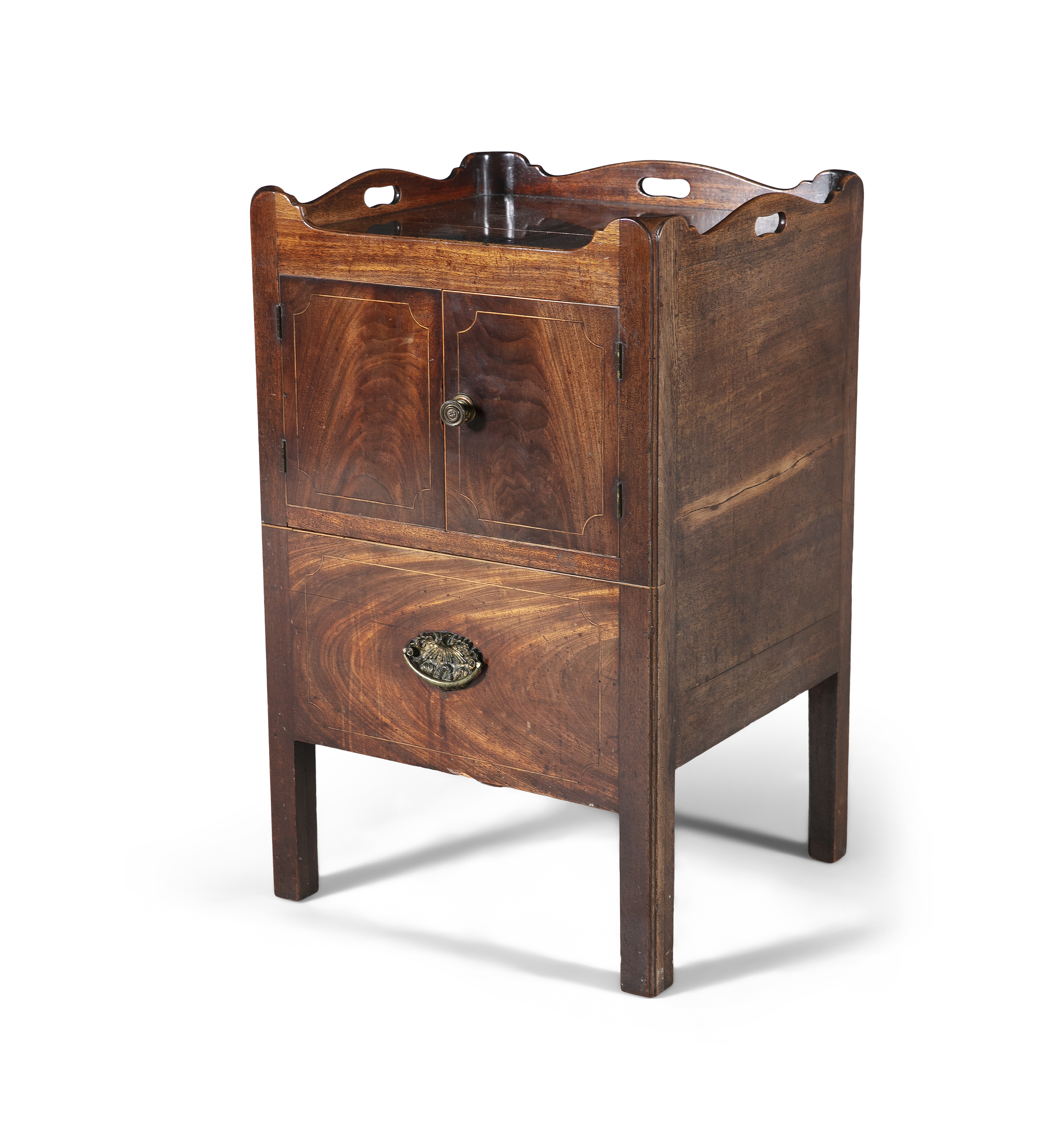 A GEORGE III MAHOGANY TRAY TOP COMMODE, with twin panel doors above a pull-out pot cupboard, on