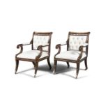 A PAIR OF REGENCY STYLE GILT AND SIMULATED ROSEWOOD ELBOW CHAIRS, with button backs, padded seats