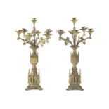 A PAIR OF 19TH CENTURY FRENCH SEVEN-LIGHT GILT-BRASS CANDELABRA IN THE FORM OF GOTHIC TOWERS, each