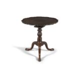 A GEORGE III MAHOGANY SHAPED CIRCULAR SNAP-TOP SUPPER TABLE, with pie crust rim, raised on a bird