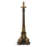 A BRONZE AND ORMOLU CLUSTER COLUMN LAMP BASE, on pedestal, with canted plinth and scrolled claw feet