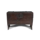A FRUITWOOD STRONG COFFER, probably 16th century, the rectangular chest with iron strapwork