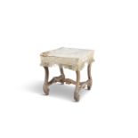 A LOUIS XVI GILTWOOD SQUARE STOOL, the square seat supported on scrolling acanthus leaf trestle