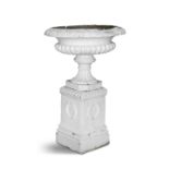 A VICTORIAN WHITE PAINTED GARDEN URN, 19tjh century, of classical form, with leaf moulded rim and