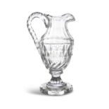 AN IRISH CUT GLASS URN SHAPED CLARET JUG, probably Cork, early 19th century, with facetted neck