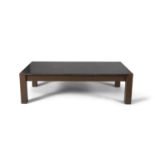 A rectangular low coffee table, the polished limestone top raised on a painted timber frame. 139.5 x