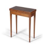 A Georgian style inlaid mahogany rectangular folding top patience table, the hinged top with