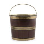 A 19th century brass banded mahogany coopered oval oyster bucket, with removable brass liner and